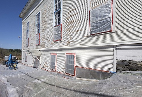 Lead paint removal on an old church siding